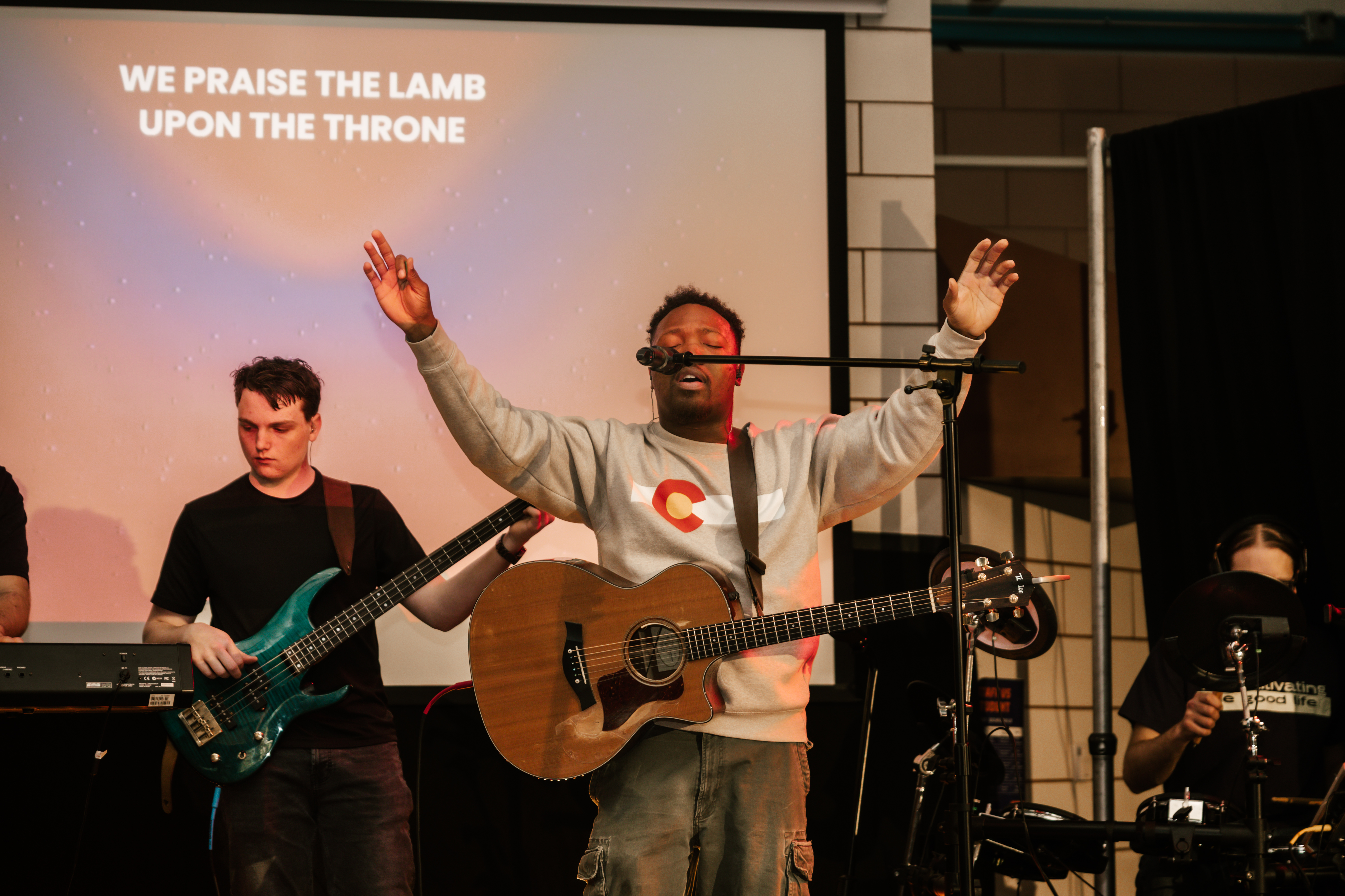 Community worship moment at Amore & Olive Studio